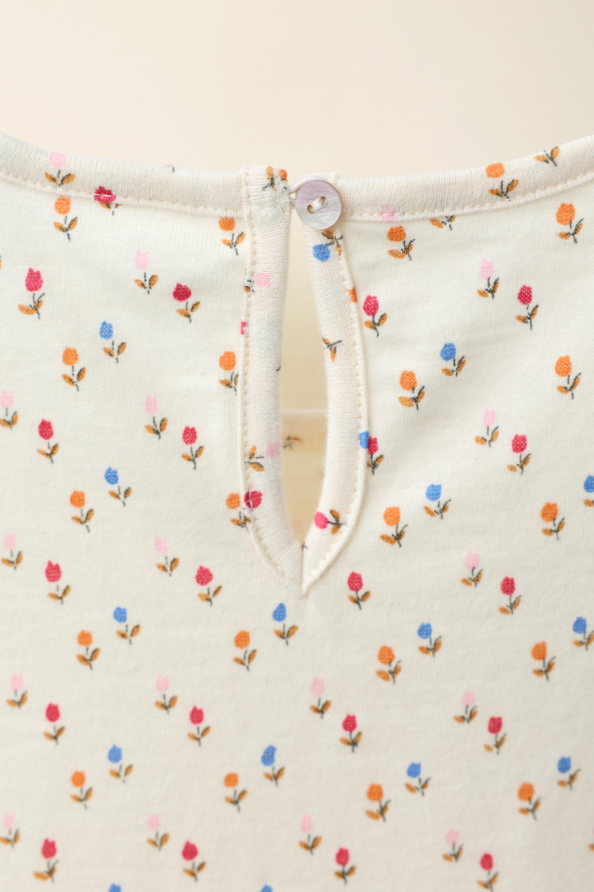 TULIP JUMPSUIT CREATED BY CARAMEL LONDON X ZARA